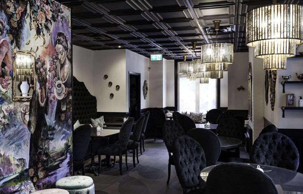 Chandeliers and velvet seating
